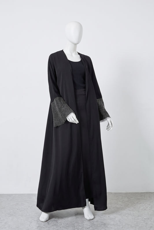 Formal black open abaya with crystal embellished sleeves on a mannequin, front view