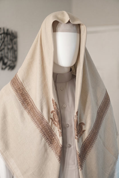 Ivory cream shemagh with embroidered border styled on white mannequin