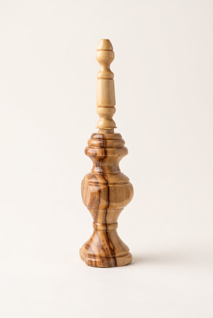 Hand-turned olive wood kohl applicator with natural swirling grain