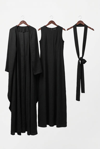Black elegant 3-piece abaya set on hangers: open abaya, dress and belt