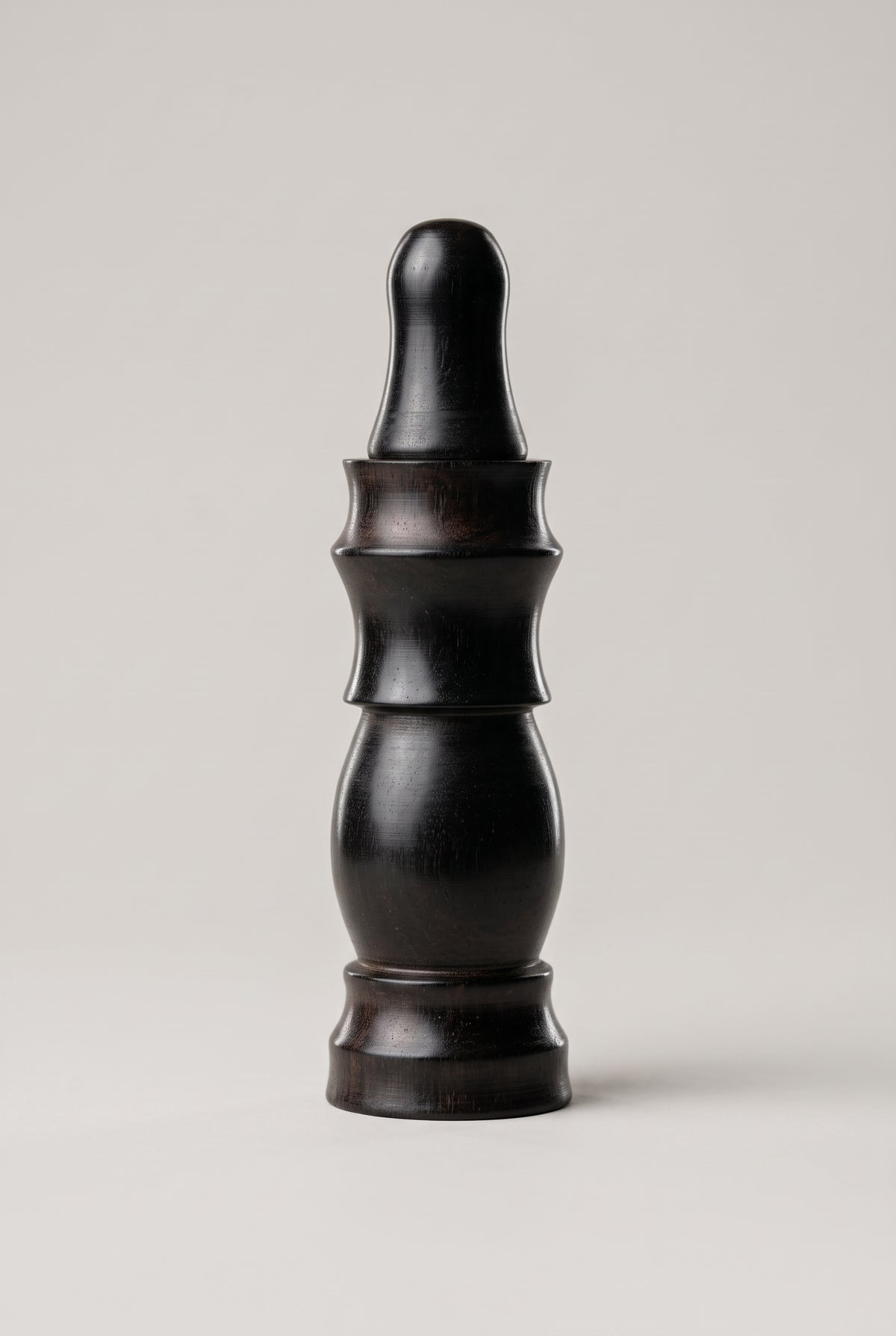 Ebony wood kohl applicator in a deep polished black finish