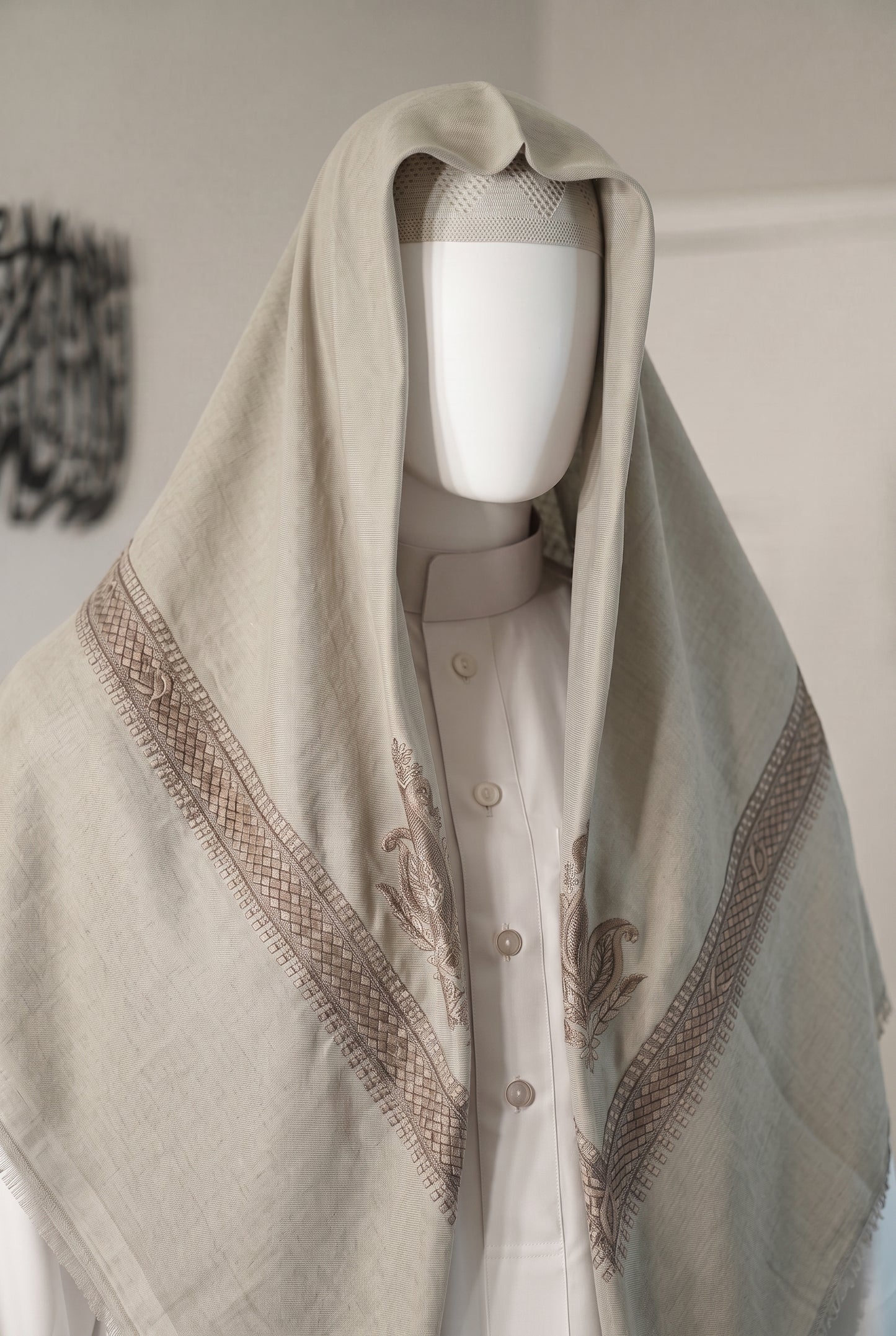 Oasis pale mint shemagh with burgundy embroidered trim on white mannequin