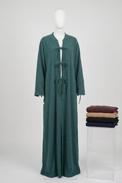 Teal ribbed front tie open abaya on a mannequin