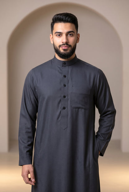 Man wearing a charcoal Al Aseel winter thobe, close view