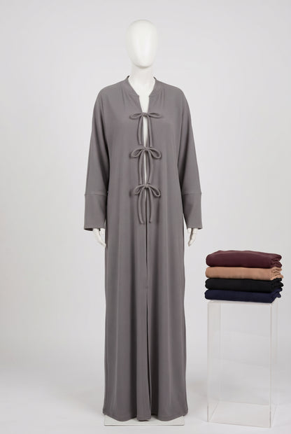 Grey ribbed front tie open abaya on a mannequin