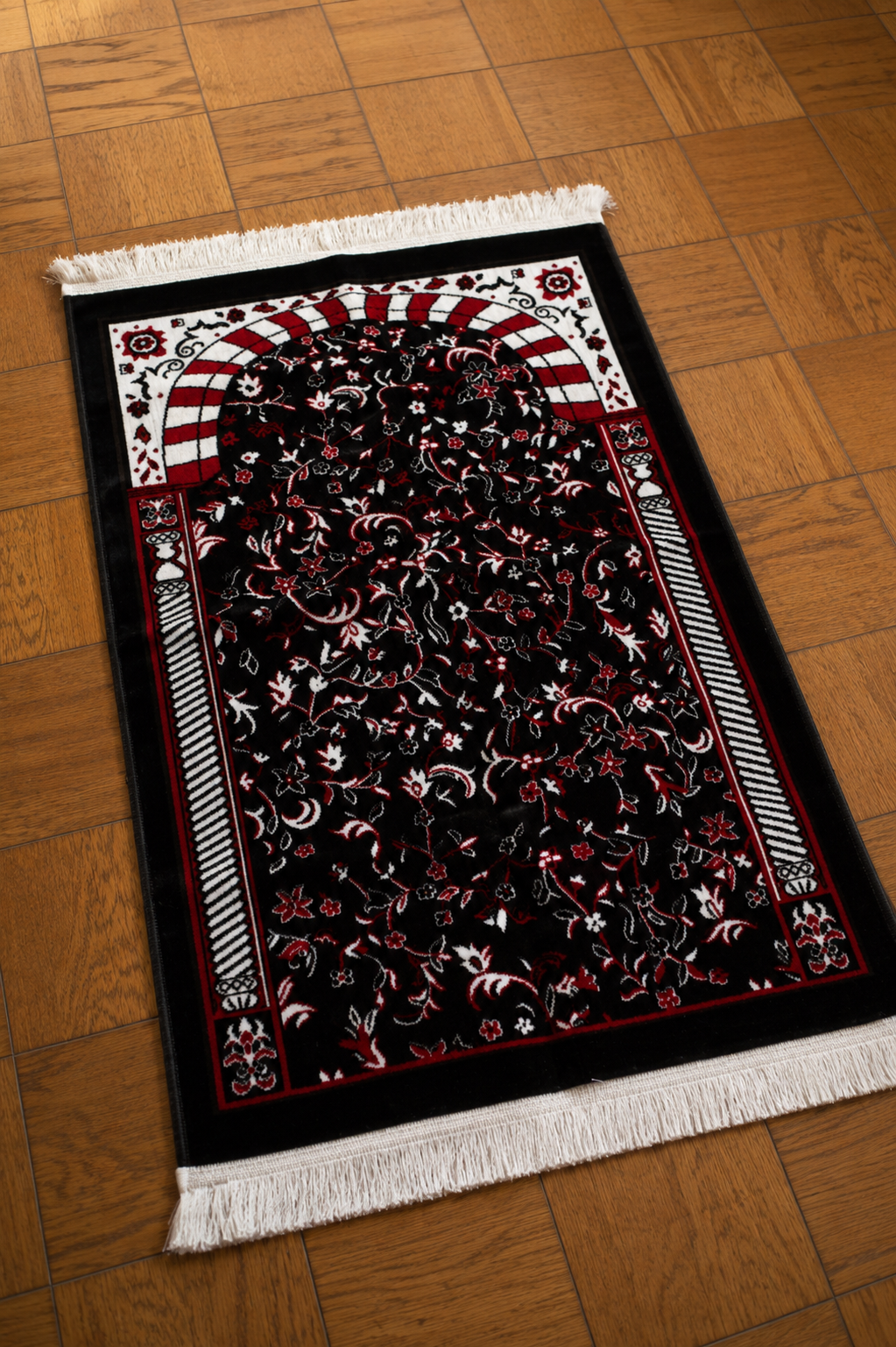 Luxurious thick Turkish prayer mat in black with intricate patterns, perfect for comfortable and focused prayer from sunnah goods
