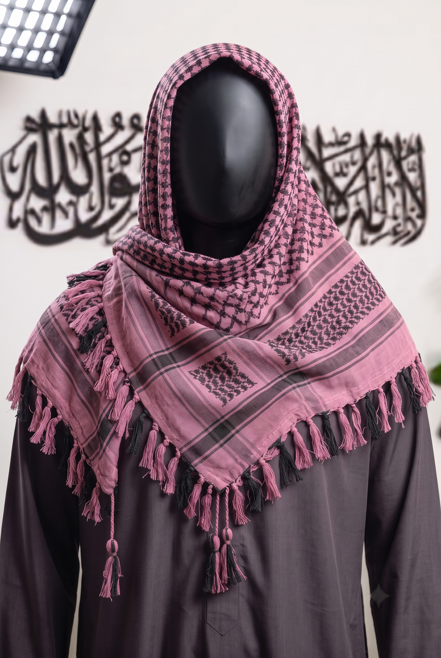 Man wearing Rosewood keffiyeh, soft pink and espresso brown cotton shemagh scarf, head wrap, studio portrait